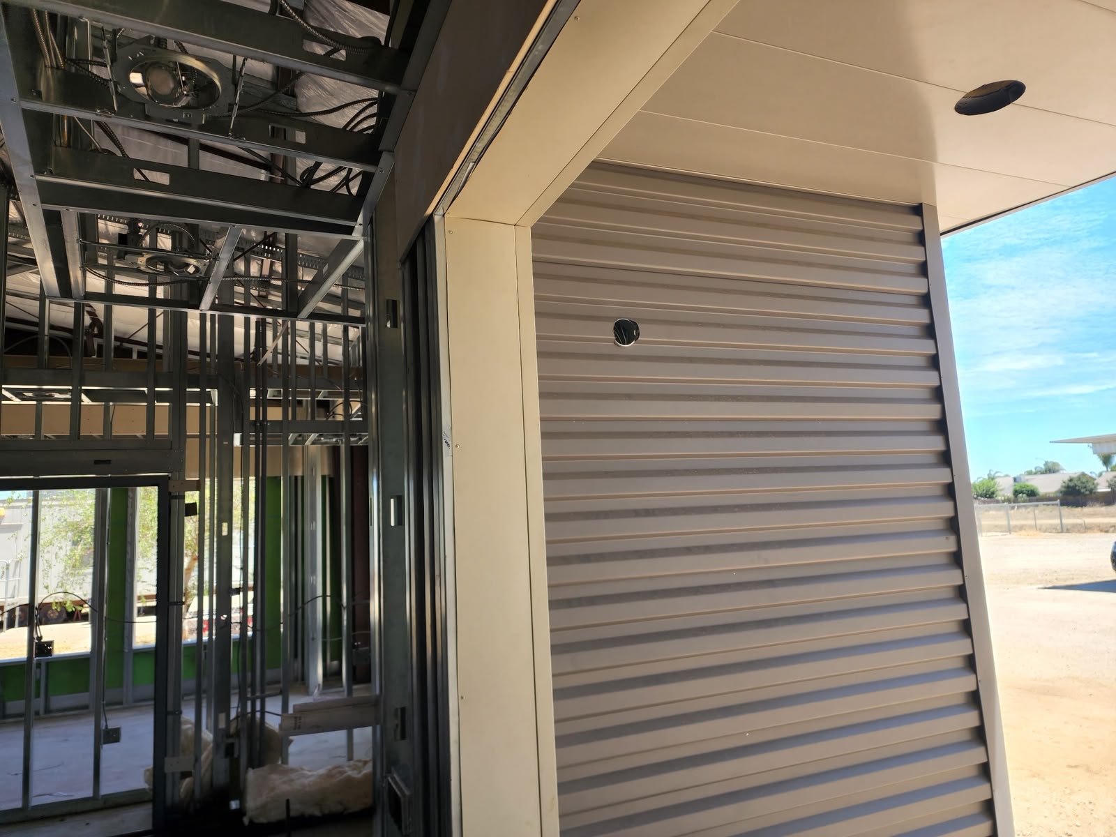Exterior metal siding with exterior lighting rough-in