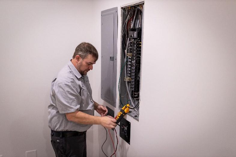 Residential electrical repair in Central Valley being diagnosed with professional testing equipment.